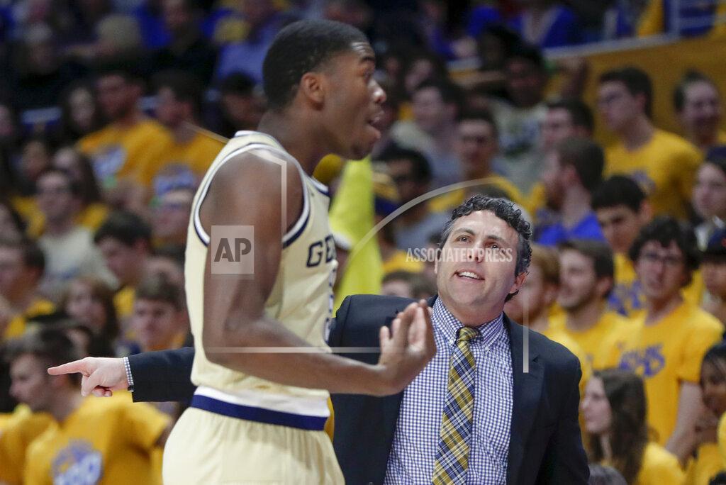 Keith Srakocic Georgia Tech's Moses Wright, left, reacts as head coach Josh Pastner talks to him during the first half of an NCAA college basketball game against Pittsburgh, Saturday, Feb. 8, 2020, in Pittsburgh. Pittsburgh won 73-64. (AP Photo/Keith Srakocic)