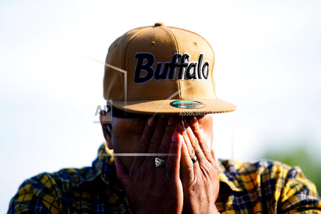 Matt Rourke Curtis Hawkins is overcome with emotion scene of Saturday's shooting at a supermarket, in Buffalo, Thursday, May 19, 2022. (AP Photo/Matt Rourke)