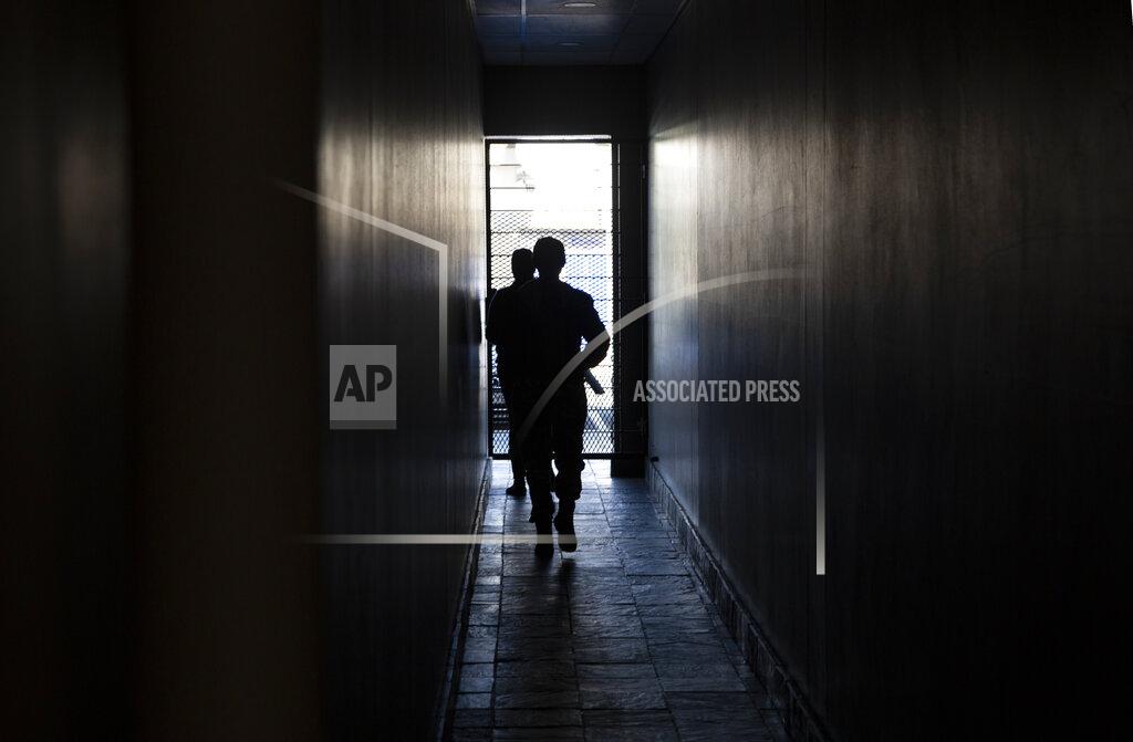 Denis Farrell A dark passage during a power outage in a Johannesburg shopping centre, Thursday, June 30, 2022. South Africans are struggling in the dark to cope with increased power cuts that have hit households and businesses across the country. The rolling power cuts have been experienced for years but this week the country’s state-owned power utility Eskom extended them so that some residents and businesses have gone without power for more than 9 hours a day. (AP Photo/Denis Farrell)