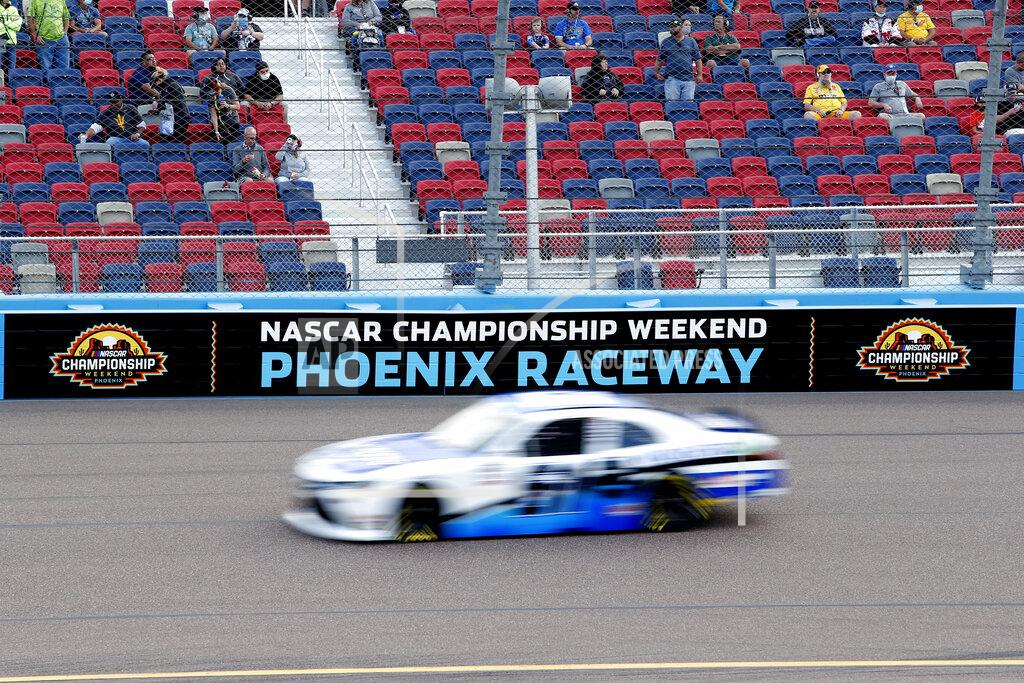 Ralph Freso A car races through Turn 4 during the NASCAR Xfinity Series auto race at Phoenix Raceway, Saturday, Nov. 7, 2020, in Avondale, Ariz. (AP Photo/Ralph Freso)