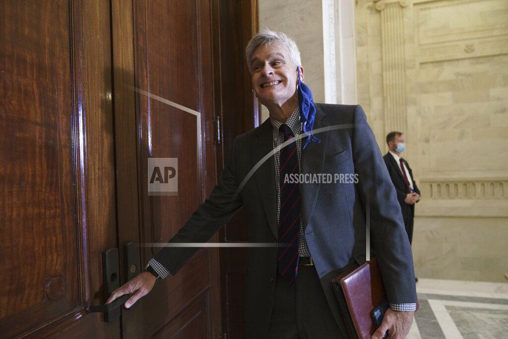 J. Scott Applewhite Rep. Bill Cassidy, R-La., arrives for Senate Republicans leadership elections but the door was locked, on Capitol Hill in Washington, Tuesday, Nov. 10, 2020. (AP Photo/J. Scott Applewhite)