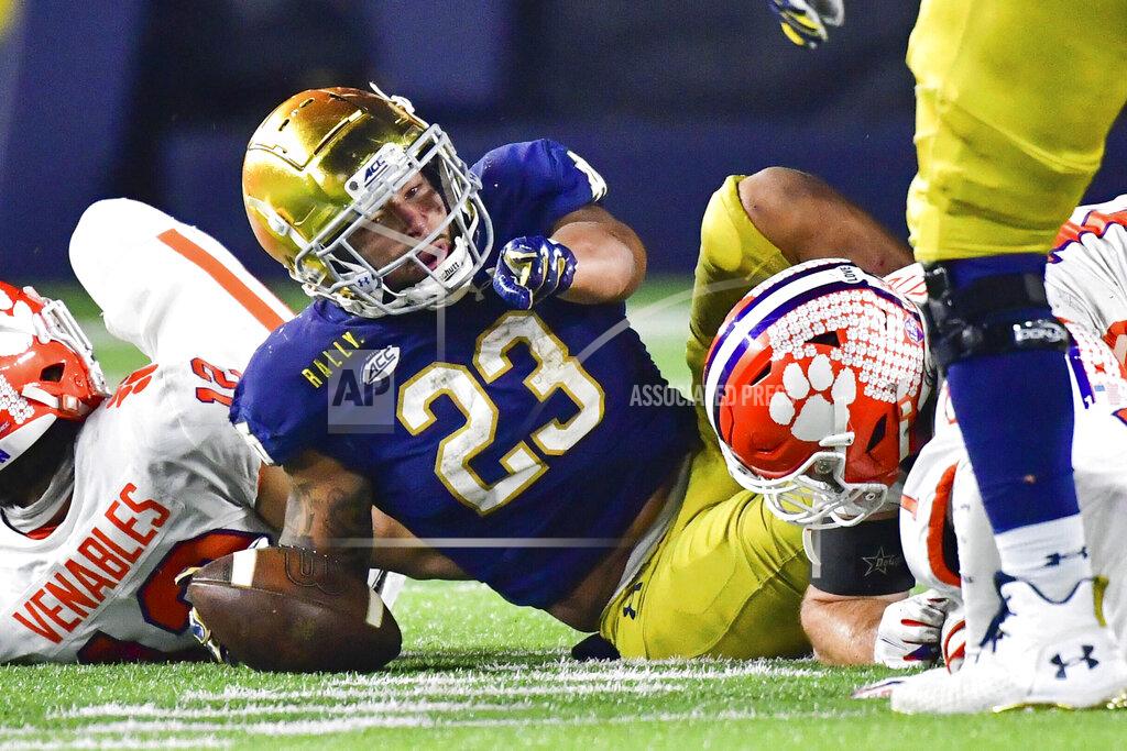 Matt Cashore Notre Dame running back Kyren Williams (23) points after being tackled during the fourth quarter against Clemson in an NCAA college football game Saturday, Nov. 7, 2020, in South Bend, Ind. (Matt Cashore/Pool Photo via AP)