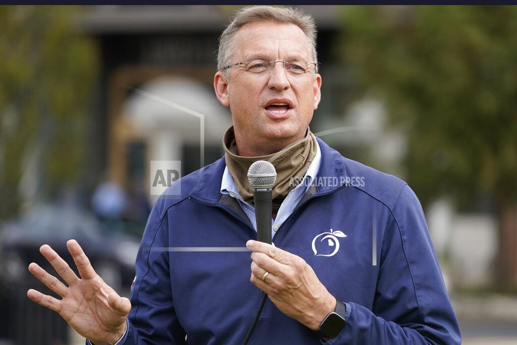 John Bazemore Georgia Republican candidate for Senate Doug Collins during a rally Thursday, Oct. 29, 2020, in Alpharetta, Ga. (AP Photo/John Bazemore)