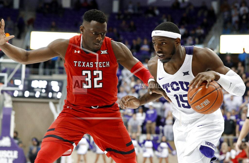 Tony Gutierrez Texas Tech center Norense Odiase (32) defends as TCU forward JD Miller (15) works to the basket in the second half of an NCAA college basketball game in Fort Worth, Texas, Saturday, March 2, 2019. Miller scored a game high 18 points in the 81-66 loss to Texas Tech. (AP Photo/Tony Gutierrez)