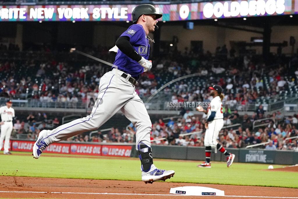 John Bazemore Colorado Rockies shortstop Trevor Story (27) rounds the bases after hitting a solo home run in the first inning of a baseball game against the Atlanta Braves Tuesday, Sept. 14, 2021, in Atlanta. (AP Photo/John Bazemore)