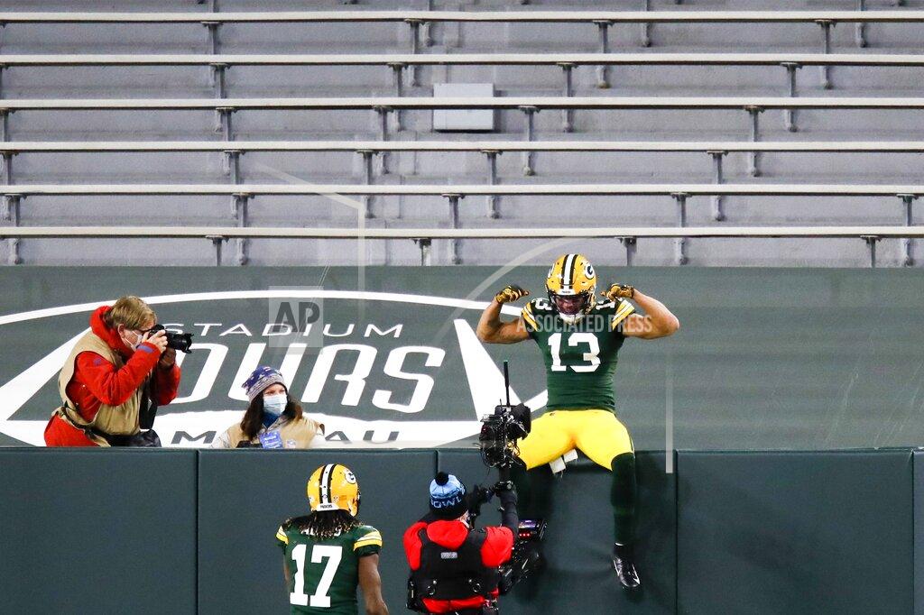 Matt Ludtke Green Bay Packers' Allen Lazard celebrates his touchdown catch during the first half of an NFL football game against the Chicago Bears Sunday, Nov. 29, 2020, in Green Bay, Wis. (AP Photo/Matt Ludtke)