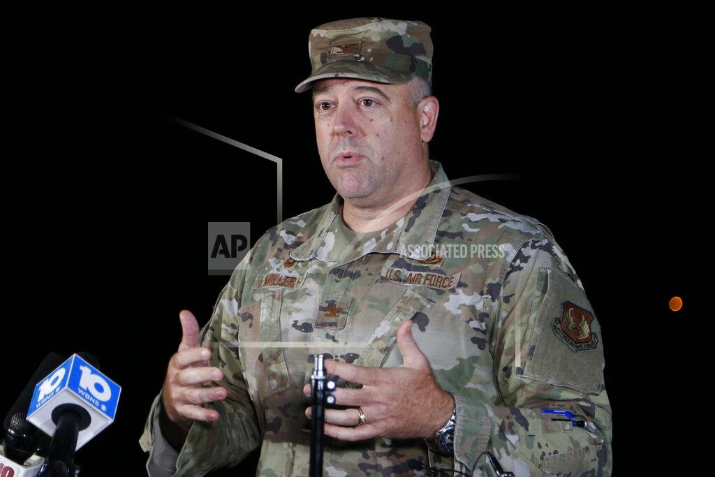 Jay Laprete Colonel Patrick MIller, 88th Air Base Wing and Installation Commander, answers questions during a news conference after a lockdown at Wright-Patterson Air Force Base Friday, Sept. 10, 2021, in Dayton, Ohio. The base was put on lockdown due to a report of an active shooter but was later given the all clear. (AP Photo/Jay LaPrete)