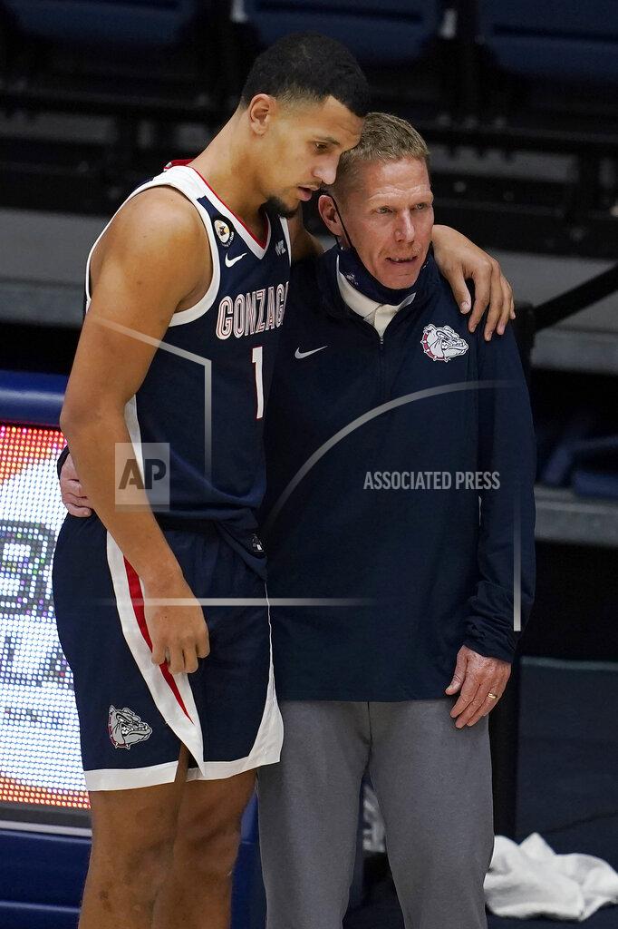 Jeff Chiu Gonzaga guard Jalen Suggs stands next to coach Mark Few during the second half of the team's NCAA college basketball game against Saint Mary's in Moraga, Calif., Saturday, Jan. 16, 2021. (AP Photo/Jeff Chiu)