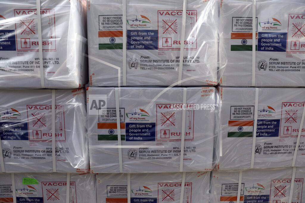 Rahmat Gul Boxes of the first shipment of 500,000 doses of the AstraZeneca coronavirus vaccine made by Serum Institute of India, donated by the Indian government, await distribution at the customs area of the Hamid Karzai International Airport, in Kabul, Afghanistan, Sunday, Feb. 7, 2021. (AP Photo/Rahmat Gul)
