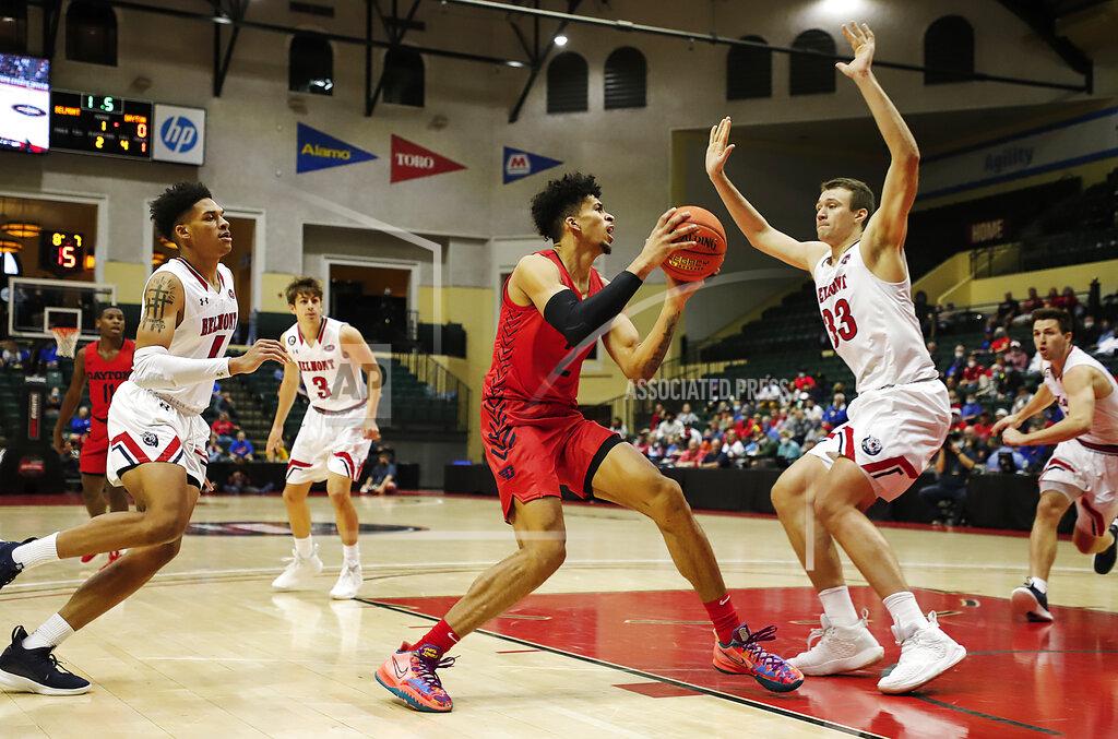 Jacob M. Langston Belmont center Nick Muszynski (33) defends against Dayton forward Toumani Camara (2) during the first half of an NCAA college basketball game Sunday, Nov. 28, 2021, in Lake Buena Vista, Fla. (AP Photo/Jacob M. Langston)