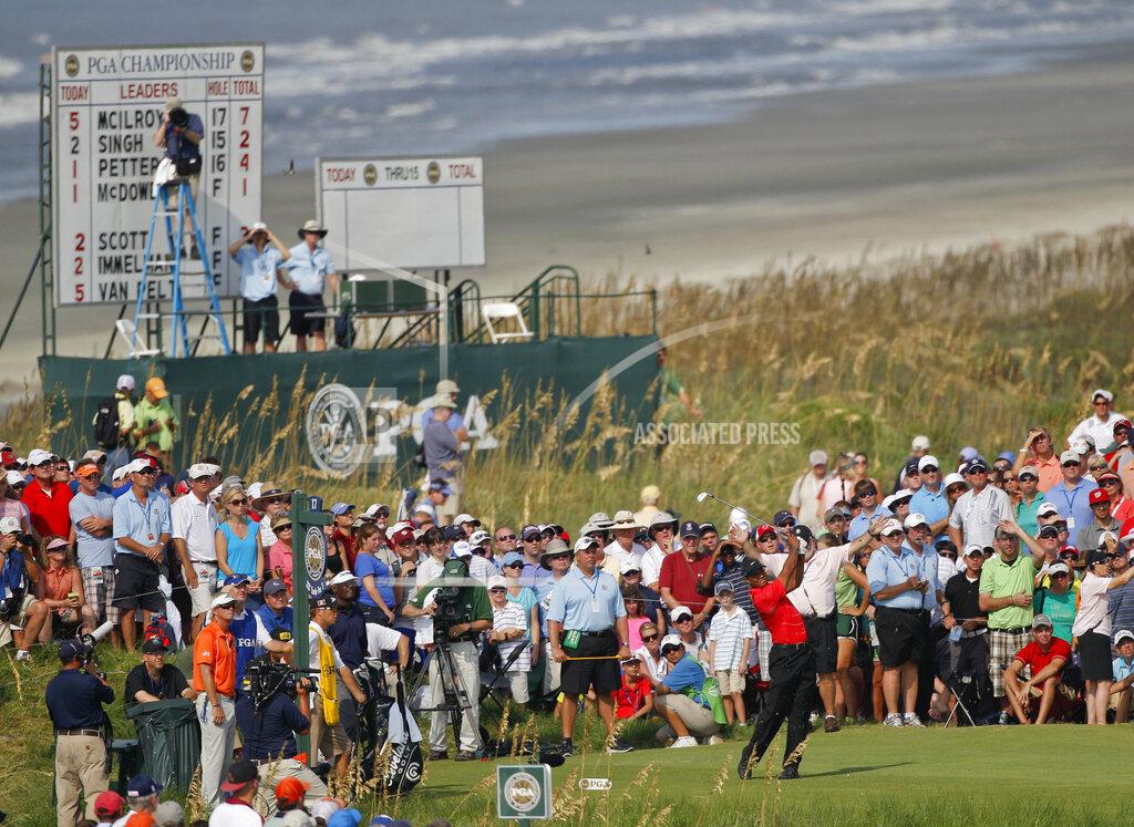 Evan Vucci FILE - Tiger Woods watches his drive from the 17th tee during the weather delayed third round of the PGA Championship golf tournament on the Ocean Course of the Kiawah Island Golf Resort in Kiawah Island, S.C., in this Sunday, Aug. 12, 2012. Only about 10,000 spectators are allowed when the PGA returns to Kiawah next week, which should help with traffic issues. (AP Photo/Evan Vucci)