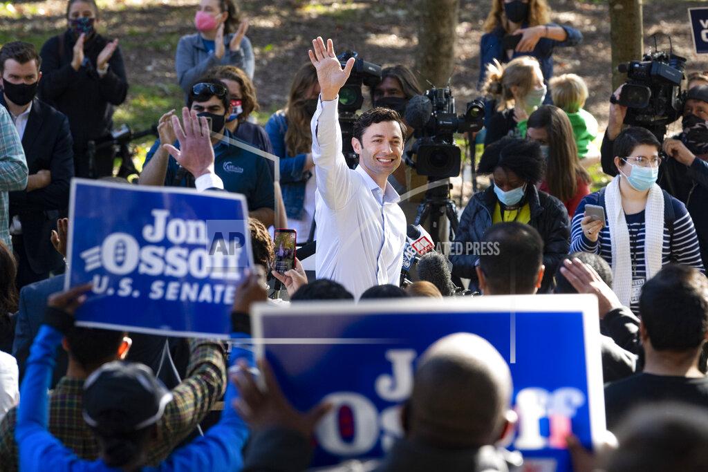 John Amis Georgia Democratic candidate for U.S. Senate Jon Ossoff rallies supporters for a run-off against Republican candidate Sen. David Perdue, as they meet in Grant Park, Friday, Nov. 6, 2020, in Atlanta. (AP Photo/John Amis)