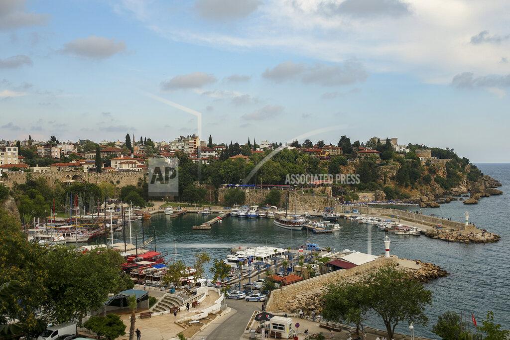 Emrah Gurel A general view of the old harbour, in Antalya, southern Turkey, Monday, June 21, 2021. Hotels in Turkey's Antalya region, a destination beloved by holidaymakers, are preparing to finally resume operations as they expect the return of international tourists after months of setbacks caused by the pandemic that halted travel. (AP Photo/Emrah Gurel)
