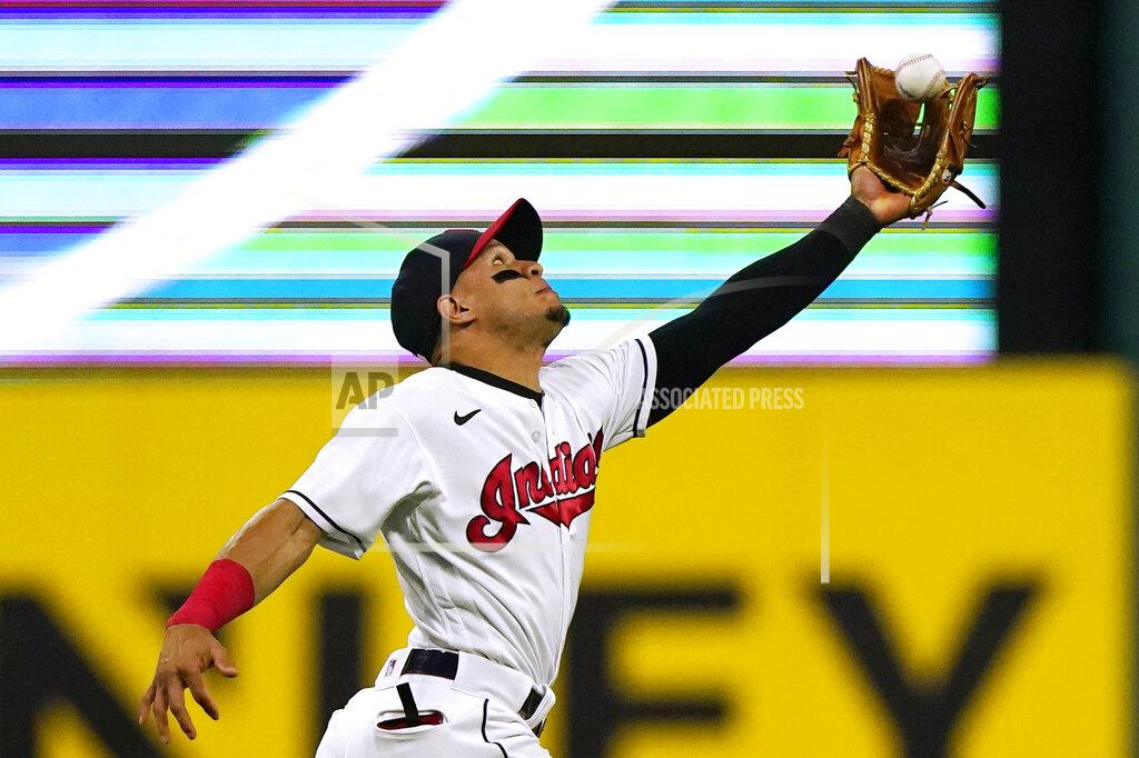 Tony Dejak Cleveland Indians' Cesar Hernandez catches a fly ball hit by Tampa Bay Rays' Mike Zunino during the sixth inning of a baseball game Saturday, July 24, 2021, in Cleveland. (AP Photo/Tony Dejak)
