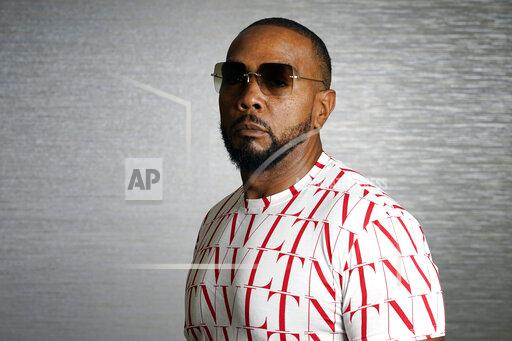 Timbaland poses for a portrait in Beverly Hills, Calif., on Thursday, Aug. 5, 2021. Timbaland, the hit-making producer for elite acts like Justin Timberlake and Jay-Z, is creating a new venture called Beatclub, a digital platform for music makers to connect with musicians, producers, songwriters, music publishers and record labels. (AP Photo/Marcio Jose Sanchez)