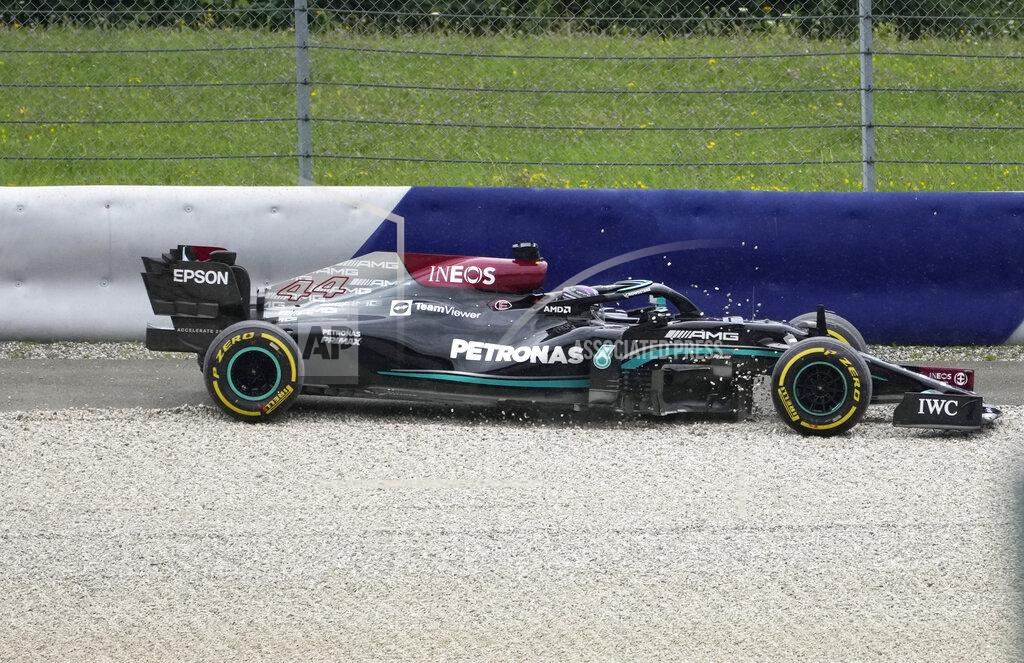 Darko Bandic Mercedes driver Lewis Hamilton of Britain goes into the gravel at Turn Four during the second free practice session for the Austrian Formula One Grand Prix at the Red Bull Ring racetrack in Spielberg, Austria, Friday, July 2, 2021. The Austrian Grand Prix will be held on Sunday. (AP Photo/Darko Bandic)