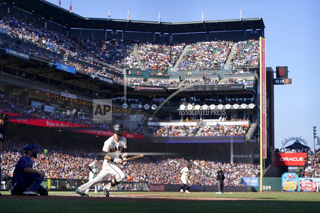 Jeff Chiu San Francisco Giants' Steven Duggar hits a two-run triple against the Los Angeles Dodgers during the second inning of a baseball game in San Francisco, Sunday, Sept. 5, 2021. (AP Photo/Jeff Chiu)