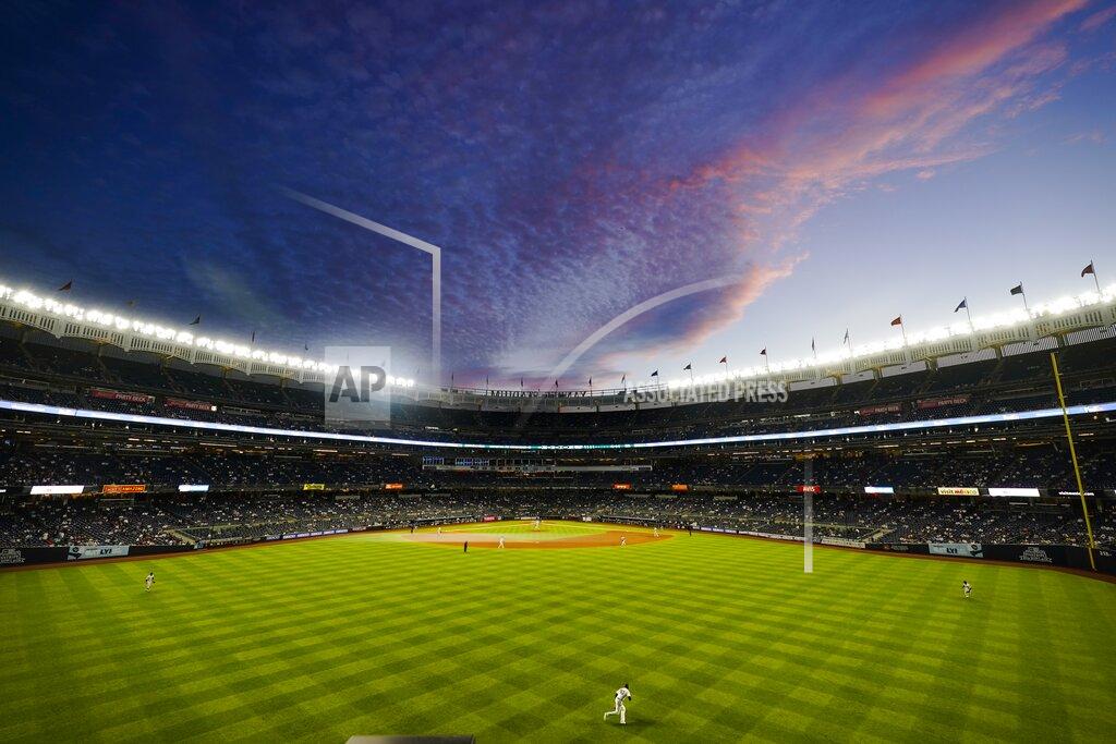 Frank Franklin Ii The New York Yankees play the Toronto Blue Jays under a pastel color sky during the fifth inning of the second game of a baseball doubleheader Thursday, May 27, 2021, in New York. (AP Photo/Frank Franklin II)