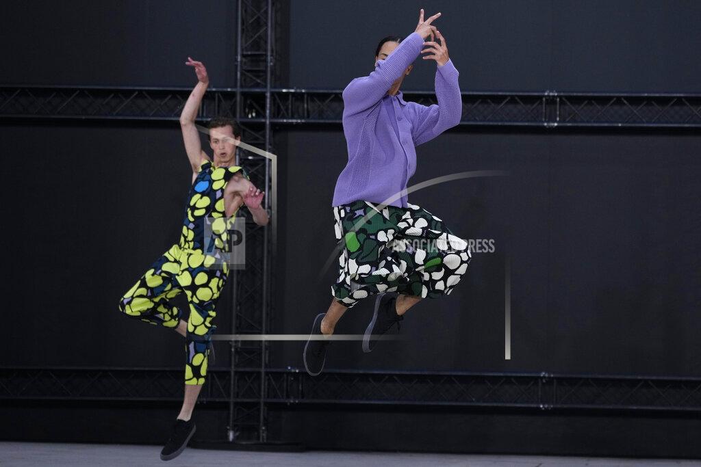 Francois Mori Models wear creations as part of Issey Miyake Homme Plisse men's Spring Summer 2023 collection presented in Paris, France, Thursday, June 23, 2022. (AP Photo/Francois Mori)