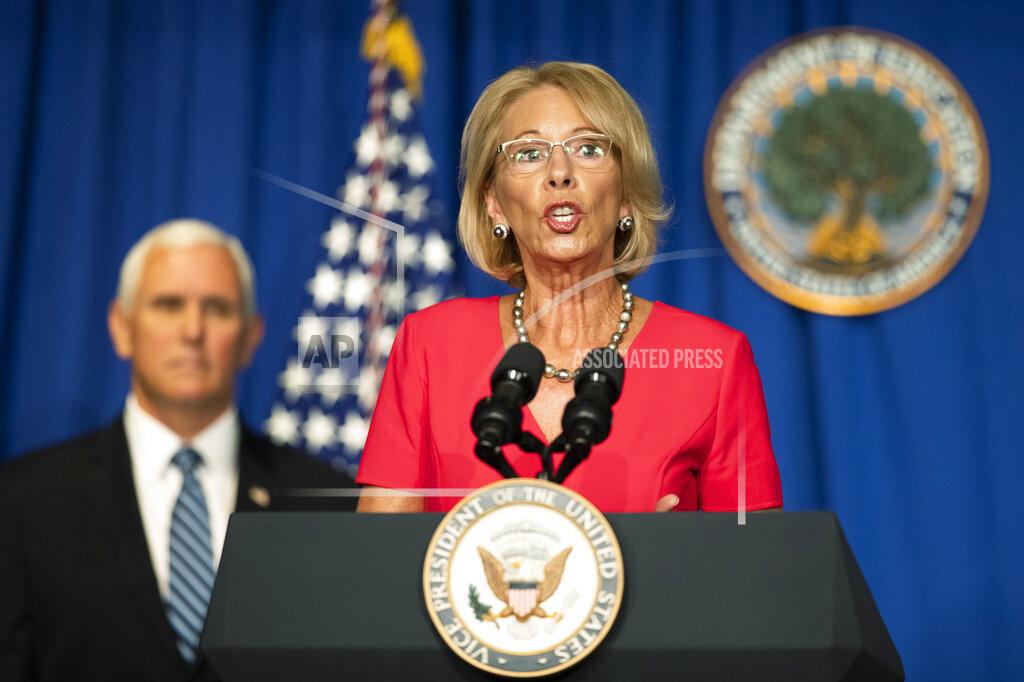 Manuel Balce Ceneta Education Secretary Betsy DeVos, with Vice President Mike Pence, speaks during a White House Coronavirus Task Force briefing at the Department of Education building Wednesday, July 8, 2020, in Washington. (AP Photo/Manuel Balce Ceneta)