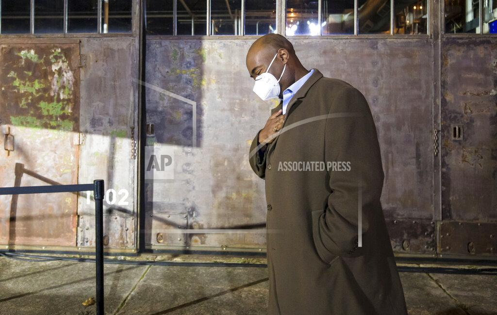 Jeff Blake U.S. Senate candidate Jaime Harrison waits to take the stage at an election watch party Hunter-Gatherer at Curtiss Wright Hangar in Columbia, S.C., Tuesday, Nov. 3, 2020, after conceding the election to incumbent Lindsey Graham. (Jeff Blake/The State via AP)