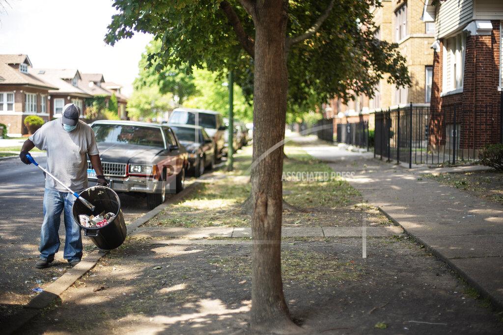 David Goldman Zarano "Zeke" Watson, 64, picks up trash and mows lawns for extra cash or sometimes volunteers his time in the Auburn Gresham neighborhood in Chicago, Wednesday, Aug. 26, 2020. Of the neighborhood, he said, "You should've seen this place in the '90s." He said, though the neighborhood has fallen on hard times again, it was worse then, more shootings and crack houses. That said, he's frustrated with the younger generation and fears they will repeat those mistakes. (AP Photo/David Goldman)