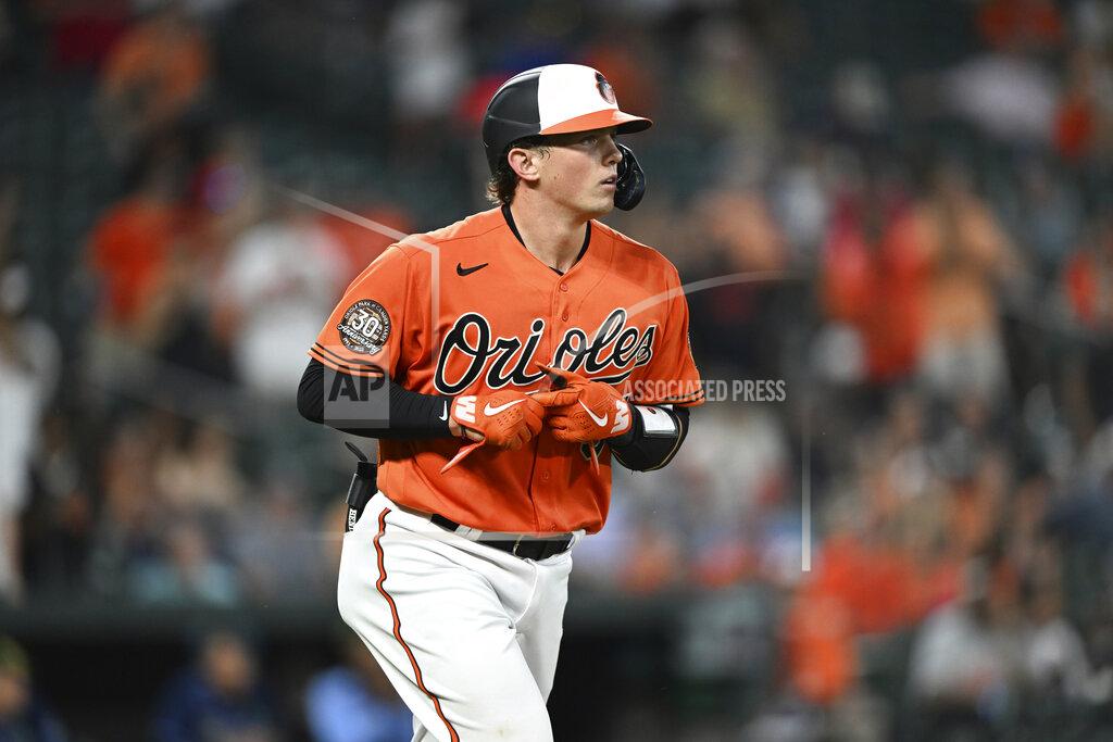 Gail Burton Baltimore Orioles' Adley Rutschman heads to first on a walk during the sixth inning of the team's baseball game against the Tampa Bay Rays on Saturday, May 21, 2022, in Baltimore. (AP Photo/Gail Burton)