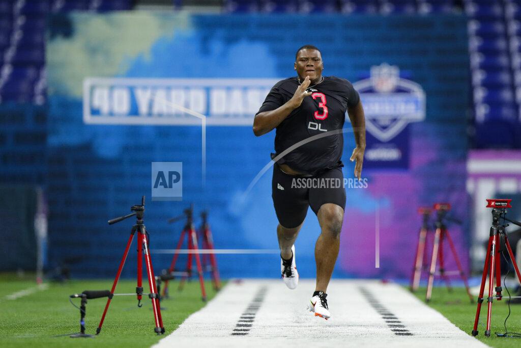Michael Conroy Auburn defensive lineman Derrick Brown runs the 40-yard dash at the NFL football scouting combine in Indianapolis, Saturday, Feb. 29, 2020. (AP Photo/Michael Conroy)