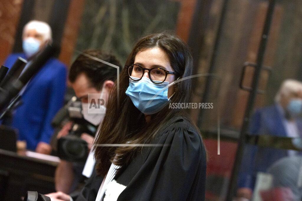 Virginia Mayo Lawyer for AstraZeneca Clemence Van Muylder waits for the start of a hearing, European Commission vs AstraZeneca, at the main courthouse in Brussels, Wednesday, May 26, 2021. The European Union took on vaccine producer AstraZeneca in a Brussels court on Wednesday with the urgent demand that the company needs to make an immediate delivery of COVID-19 shots the 27-nation bloc insists were already due. (AP Photo/Virginia Mayo)