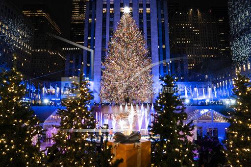 The Rockefeller Center Christmas tree stands lit at Rockefeller Center during the 89th annual Rockefeller Center Christmas tree lighting ceremony, Wednesday, Dec. 1, 2021, in New York. (AP Photo/John Minchillo)