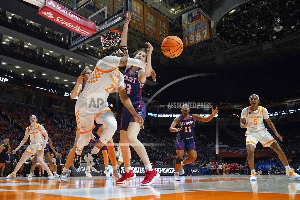 Mark Humphrey Tennessee's Alexus Dye (2) passes the ball away from Belmont's Nikki Baird (23) in the second half of a women's college basketball game in the second round of the NCAA tournament Monday, March 21, 2022, in Knoxville, Tenn. (AP Photo/Mark Humphrey)