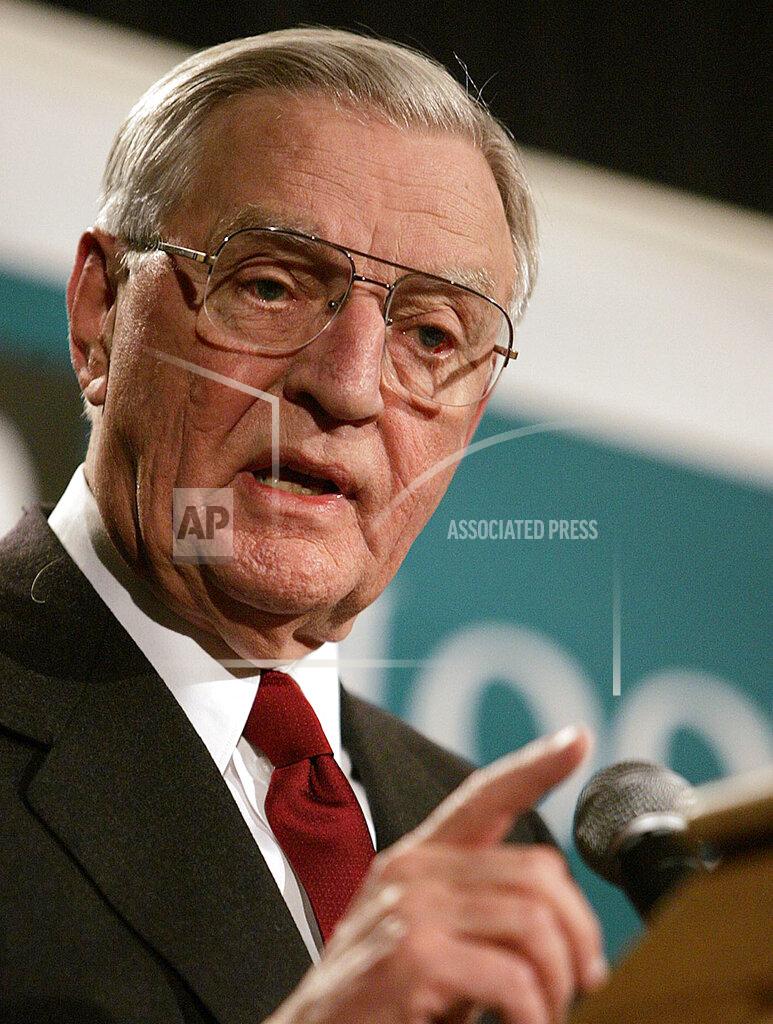 Eric Rowley FILE - In a March 14, 2005, file photo, former Vice President Walter Mondale speaks during the Second Annual Hoover-Wallace Dinner before receiving a Hoover-Wallace Humanitarian Leadership Award in Des Moines, Iowa. Mondale, a liberal icon who lost the most lopsided presidential election after bluntly telling voters to expect a tax increase if he won, died Monday, April 19, 2021. He was 93. (AP Photo/Eric Rowley, File)