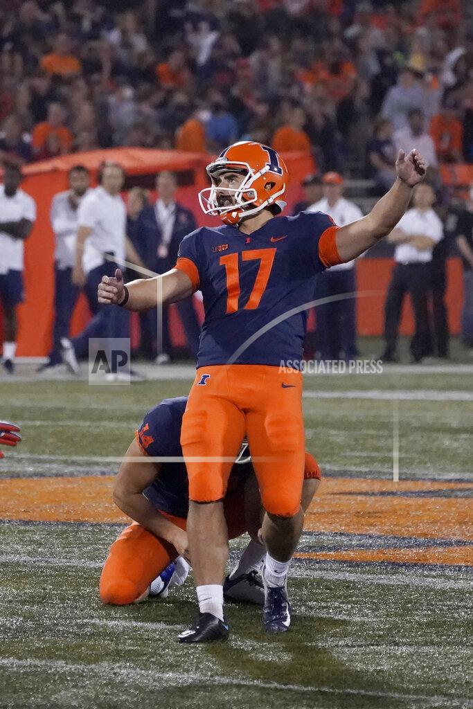 Charles Rex Arbogast Illinois place kicker James McCourt watches his 53-yard field goal during the second half of an NCAA college football game against UTSA, Saturday, Sept. 4, 2021, in Champaign, Ill. (AP Photo/Charles Rex Arbogast)