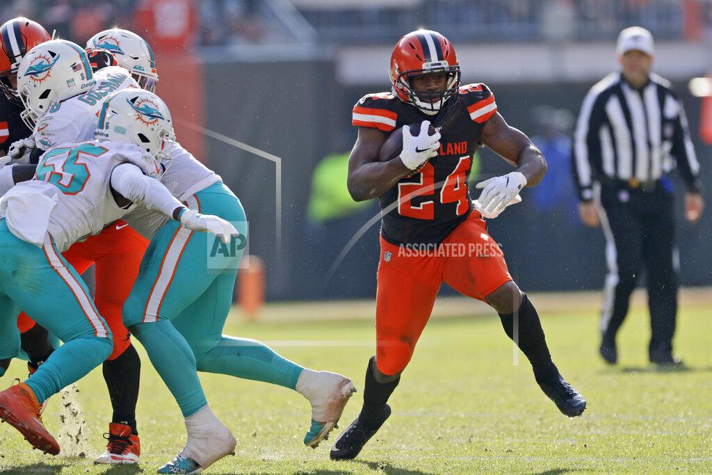 Ron Schwane Cleveland Browns running back Nick Chubb (24) rushes during the first half of an NFL football game against the Miami Dolphins, Sunday, Nov. 24, 2019, in Cleveland. (AP Photo/Ron Schwane)