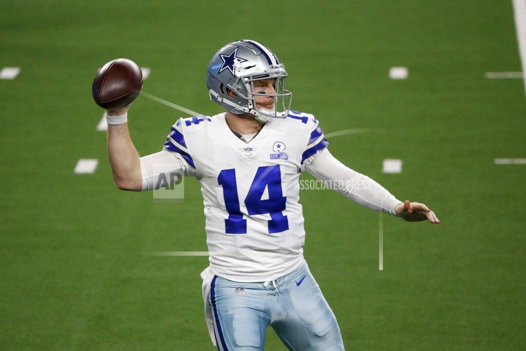Michael Ainsworth Dallas Cowboys' Andy Dalton (14) throws a pass in the second half of an NFL football game against the Arizona Cardinals in Arlington, Texas, Monday, Oct. 19, 2020. (AP Photo/Michael Ainsworth)