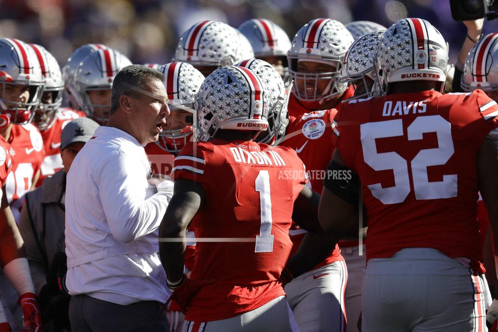 Marcio Jose Sanchez Ohio State head coach Urban Meyer talks to the team during warm ups before the Rose Bowl NCAA college football game against Washington Tuesday, Jan. 1, 2019, in Pasadena, Calif. (AP Photo/Marcio Jose Sanchez)