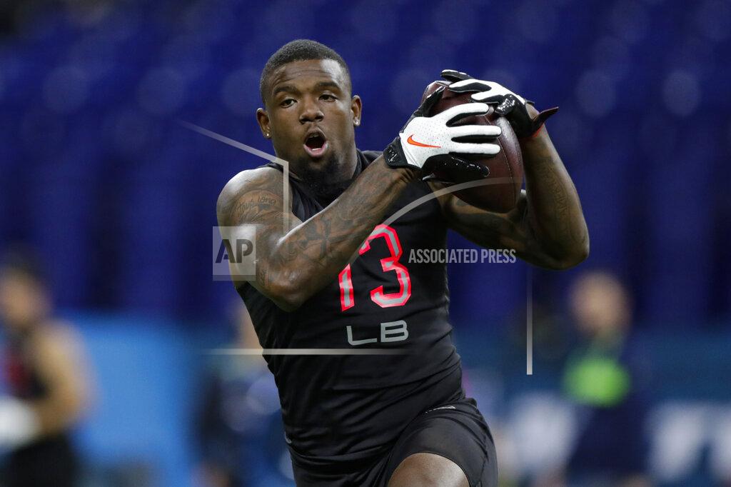 Michael Conroy LSU linebacker Michael Divinity runs a drill at the NFL football scouting combine in Indianapolis, Saturday, Feb. 29, 2020. (AP Photo/Michael Conroy)