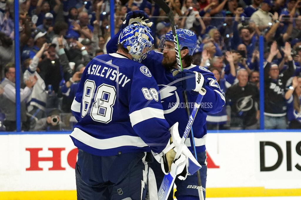 Chris O'MEara Tampa Bay Lightning goaltender Andrei Vasilevskiy (88) celebrates with defenseman Ryan McDonagh (27) after the Lightning eliminated the Florida Panthers during Game 4 of an NHL hockey second-round playoff series Monday, May 23, 2022, in Tampa, Fla. (AP Photo/Chris O'Meara)