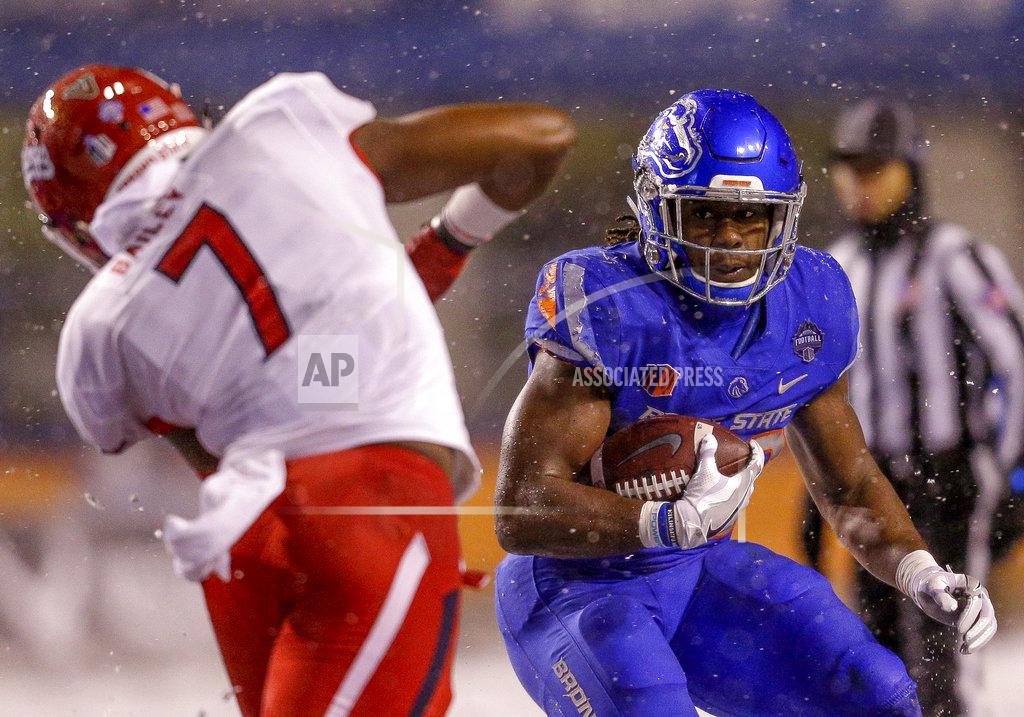 Steve Conner Boise State running back Alexander Mattison carries the ball as Fresno State linebacker James Bailey (7) closes in during the second half of an NCAA college football game for the Mountain West championship, Saturday, Dec. 1, 2018, in Boise, Idaho. Fresno State won 19-16. (AP Photo/Steve Conner)