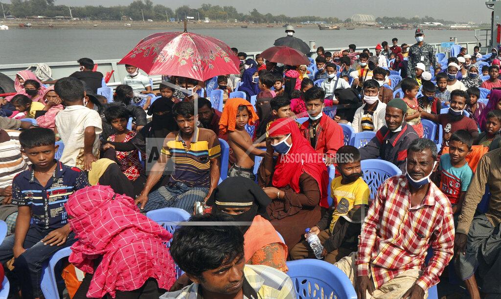 Uncredited Rohingya refugees are transported on a naval vessel to Bhashan Char, or floating island, in the Bay of Bengal, from Chittagong, Bangladesh, Friday, Dec. 4, 2020. Authorities in Bangladesh on Friday started sending a first group of nearly more than 1,500 Rohingya refugees to an isolated island despite calls by human rights groups for a halt to the process. (AP Photo).