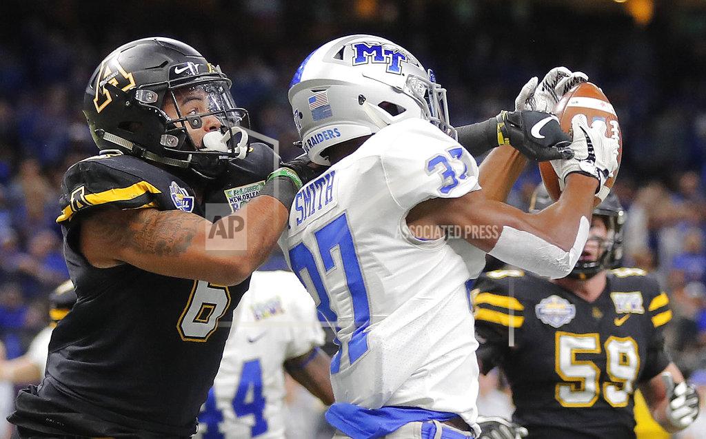 Gerald Herbert Appalachian State defensive back Desmond Franklin (6) breaks up a pass in the end zone intended for Middle Tennessee wide receiver Patrick Smith (37) in the first half of the New Orleans Bowl NCAA college football game in New Orleans, Saturday, Dec. 15, 2018. (AP Photo/Gerald Herbert)