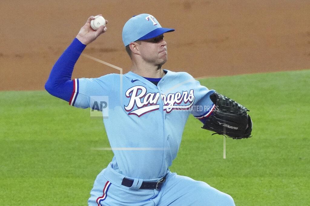 Louis Deluca Texas Rangers starting pitcher Corey Kluber throws against the Colorado Rockies in the first inning of a baseball game Sunday, July 26, 2020, in Arlington, Texas. Kluber was removed from the game after one inning. (AP Photo/Louis DeLuca)