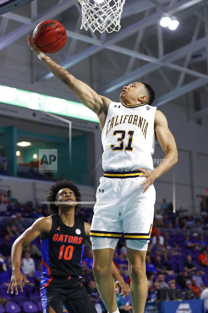 Scott Audette California guard Jordan Shepherd (31) drives to the basket past Florida guard Elijah Kennedy (10) during the second half of an NCAA college basketball game on Monday, Nov. 22, 2021, in Fort Myers, Fla. (AP Photo/Scott Audette)