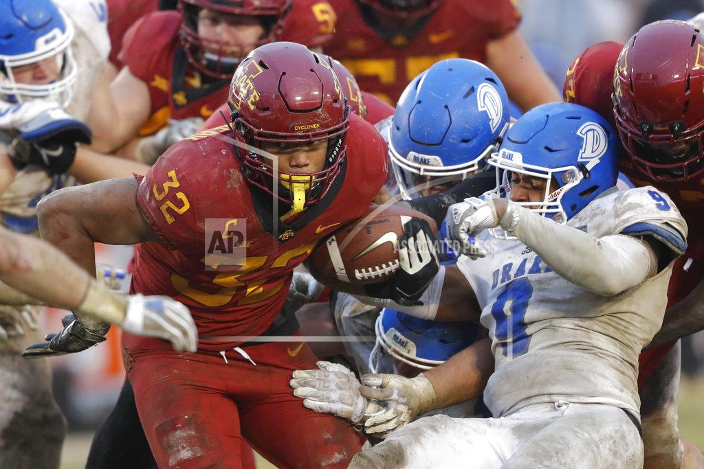 Charlie Neibergall Iowa State running back David Montgomery (32) breaks a tackle by Drake defensive back Alex Rogers (9) during the second half of an NCAA college football game, Saturday, Dec. 1, 2018, in Ames, Iowa. Iowa State won 27-24. (AP Photo/Charlie Neibergall)