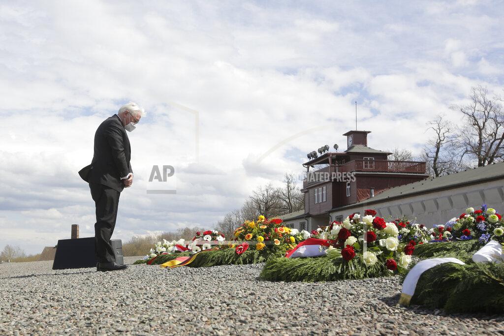 Markus Schreiber German President Frank-Walter Steinmeier lays down a wreath during commemorations marking the 76th anniversary of the liberation of the Nazi concentration camp Buchenwald near Weimar, Germany, Sunday, April 11, 2021. On April 11, 1945 the US Army liberated the concentration camp Buchenwald. (AP Photo/Markus Schreiber)