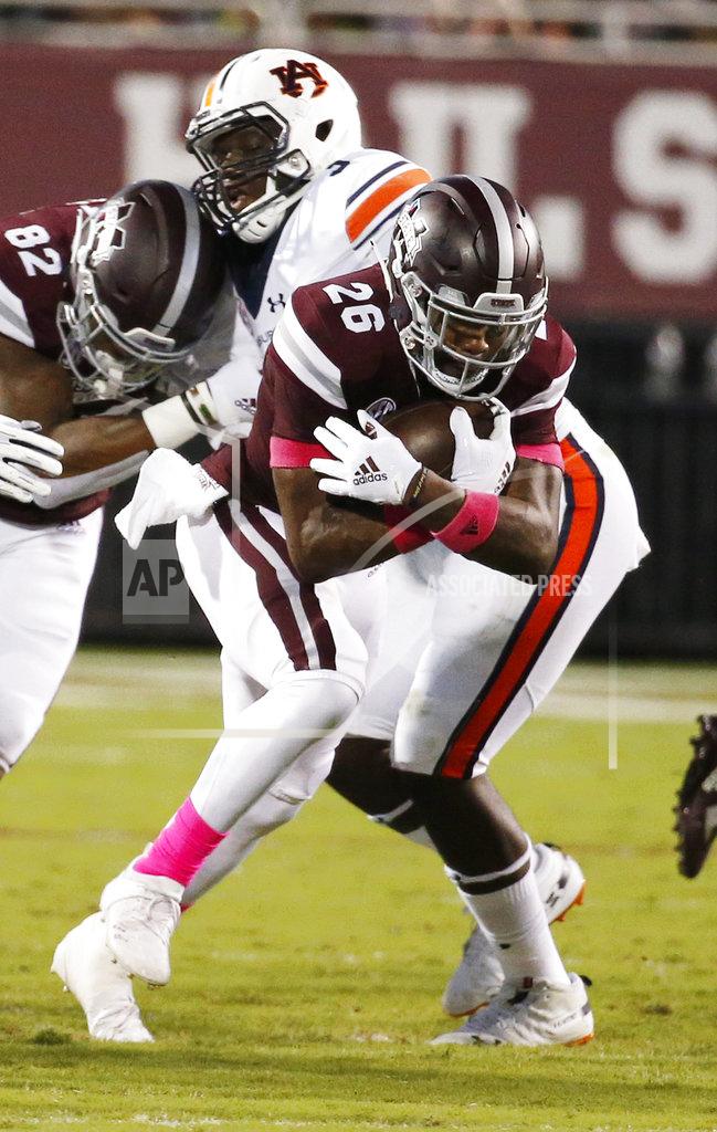 Rogelio V. Solis Mississippi State running back Aeris Williams (26) runs past an Auburn defender during the first half of their NCAA college football game in Starkville, Miss., Saturday, Oct. 6 2018. (AP Photo/Rogelio V. Solis)