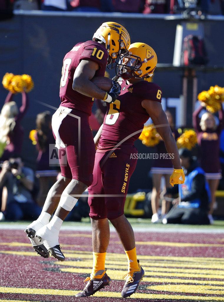 John Locher Arizona State wide receiver Geordon Porter, right, celebrates after wide receiver Kyle Williams, left, scored a touchdown against Fresno State during the first half of the Las Vegas Bowl NCAA college football game, Saturday, Dec. 15, 2018, in Las Vegas. (AP Photo/John Locher)