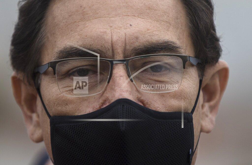 Rodrigo Abd Peru's President Martin Vizcarra attends the start of a house-to-house coronavirus testing drive and food distribution in Villa el Salvador, on the outskirts of Lima, Peru, Tuesday, Sept. 15, 2020. (AP Photo/Rodrigo Abd)