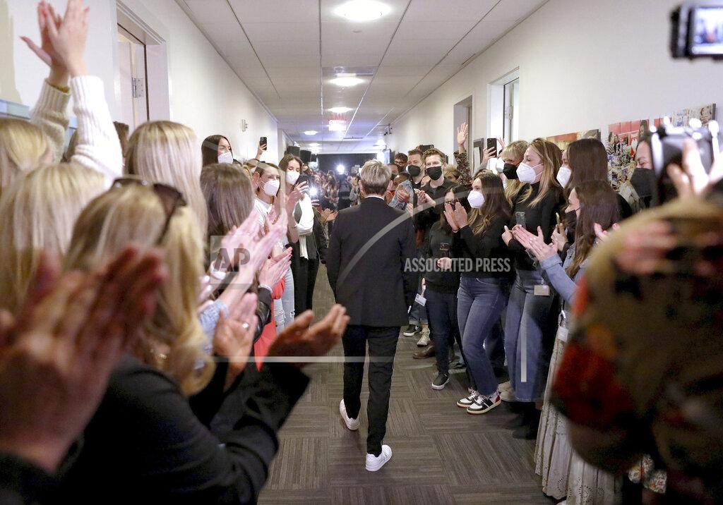 Michael Rozman In this photo released by Warner Bros., talk show host Ellen DeGeneres is applauded during the taping of "The Ellen DeGeneres Show" at the Warner Bros. lot in Burbank, Calif. (Michael Rozman/Warner Bros. via AP)