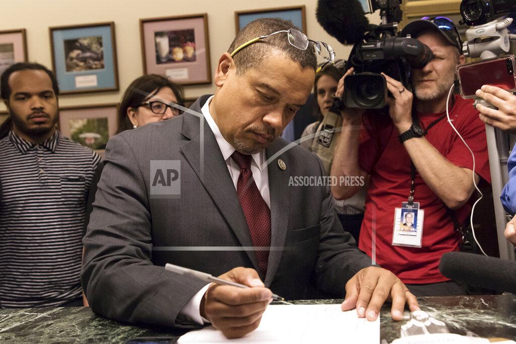 Lacey Young FILE - In this June 5, 2018, file photo, Rep. Keith Ellison, the first Muslim elected to Congress and a top official with the Democratic National Committee, files to run for Minnesota attorney general at the Secretary of State's office in St. Paul, Minn. Ellison is now the Minnesota attorney general who is taking over as lead prosecutor in George Floyd's death. Doing so is giving Ellison a national platform to talk about race in America. And while Ellison is careful not to talk about details of the criminal cases against four Minneapolis police officers, he's grabbing the opportunity to raise issues about police reform that he's worked on in the past. (Lacy Young//Minnesota Public Radio via AP, File)